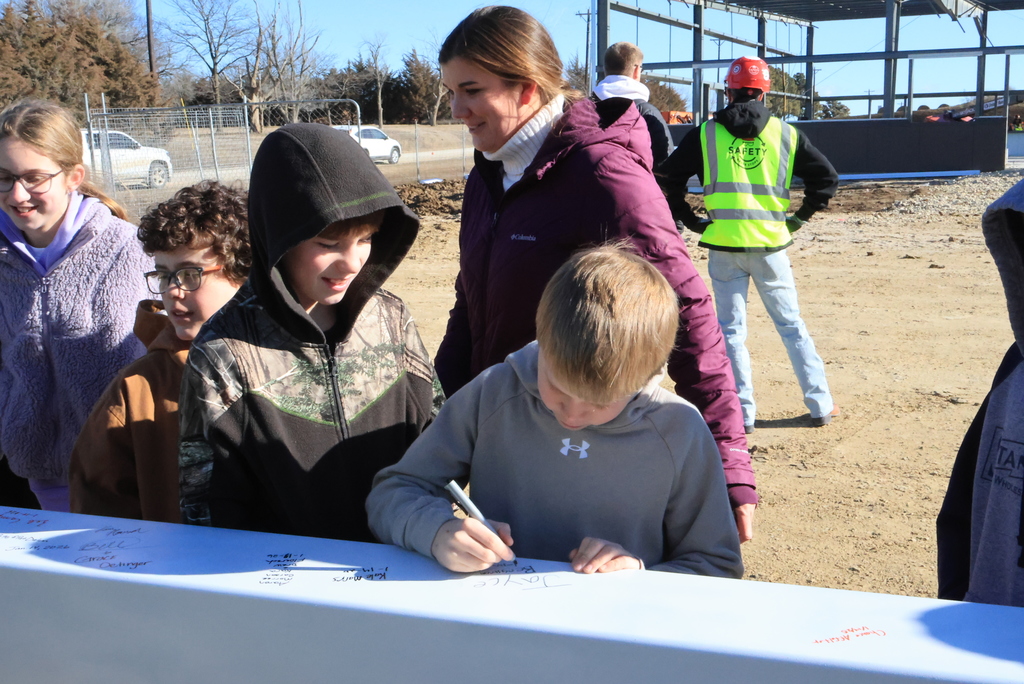 Mrs. Koster's 6th grade ELA students took time this morning to head down the block and sign one of the beams going up in the new Multigenerational Life Center! #celebrate379