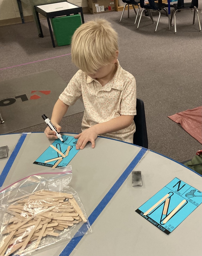 Writing requires strong hand, wrist, and finger muscles! Here are some of the ways Mrs. Bruggeman's Pre-K students wrote letters last week. #celebrate379