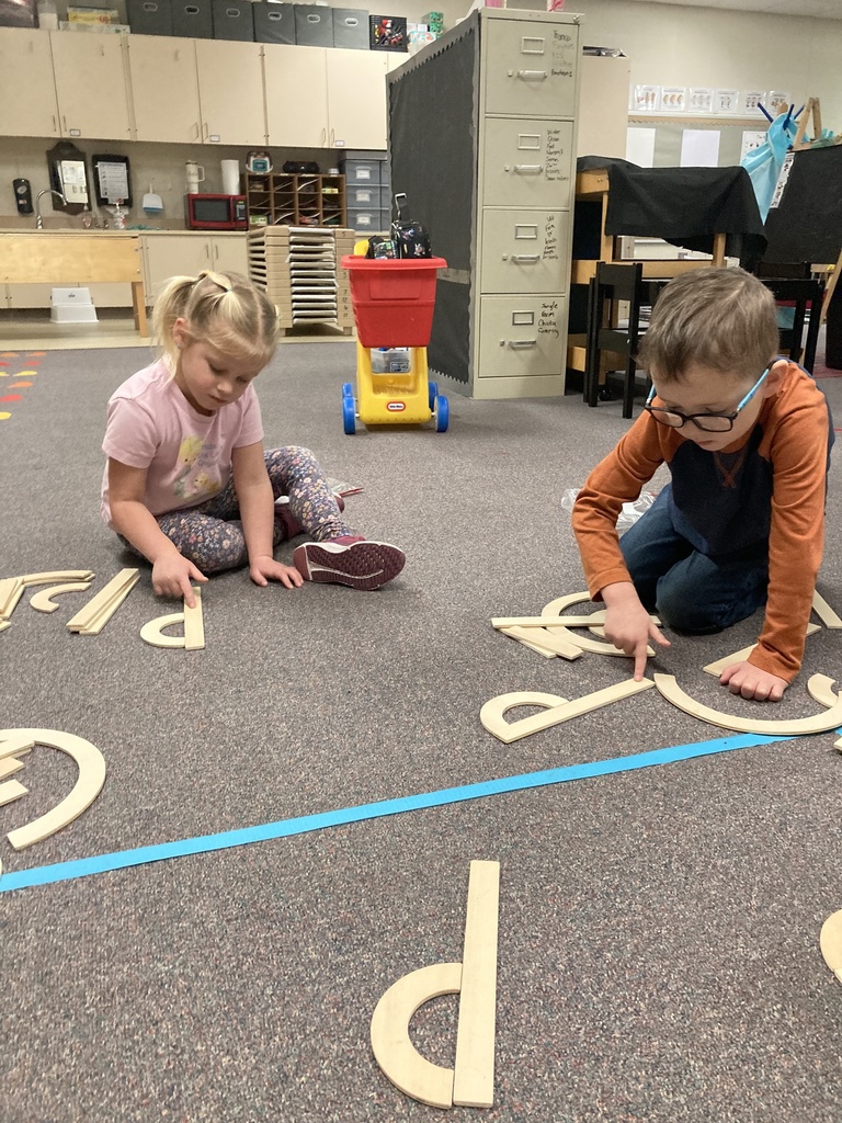 Writing requires strong hand, wrist, and finger muscles! Here are some of the ways Mrs. Bruggeman's Pre-K students wrote letters last week. #celebrate379