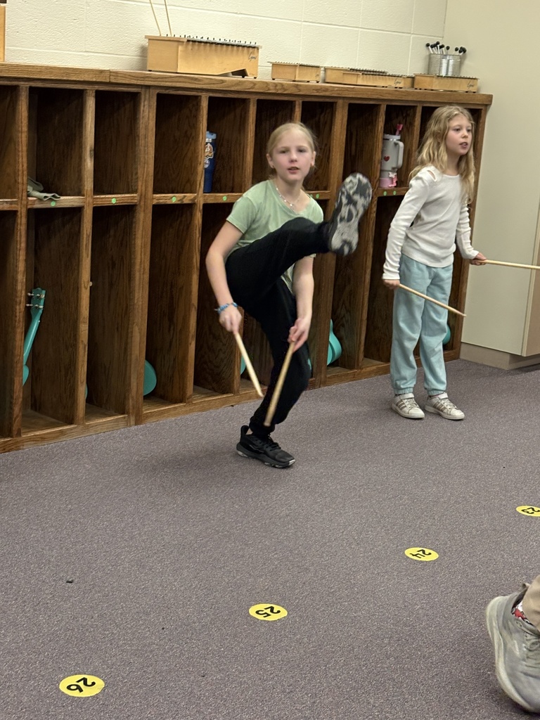 Miss Smith, Garfield's music student teacher from K-State, is teaching students a Mexican folk dance called Los Machetes. Students are using drumsticks to represent the machetes the men traditionally used while performing this dance. #celebrate379