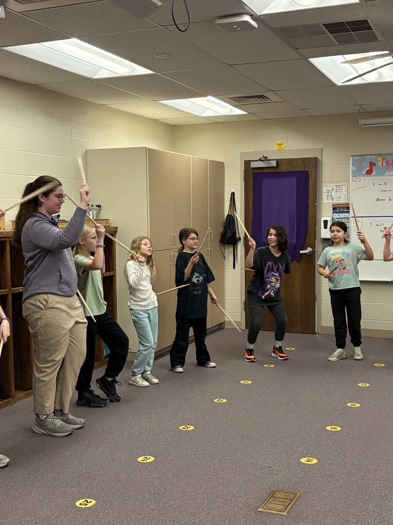 Miss Smith, Garfield's music student teacher from K-State, is teaching students a Mexican folk dance called Los Machetes. Students are using drumsticks to represent the machetes the men traditionally used while performing this dance. #celebrate379