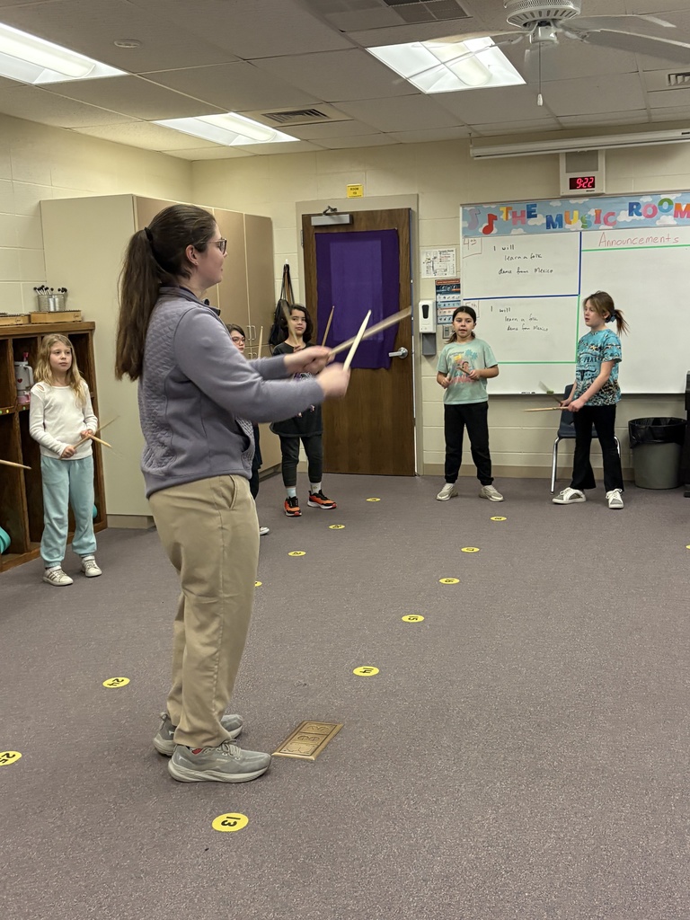 Miss Smith, Garfield's music student teacher from K-State, is teaching students a Mexican folk dance called Los Machetes. Students are using drumsticks to represent the machetes the men traditionally used while performing this dance. #celebrate379