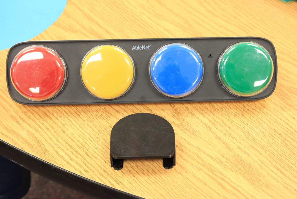 An inspiring story of innovation and students helping students...  Chase is a 4th grader at Garfield. He is working on expanding his communication skills using buttons with prompts. This is new to Chase, and he struggles at times accidentally hitting the wrong buttons. It was a problem that Speech and Language Therapist Shanna Freeman thought could be solved.  That's where Mrs. Schooley’s CCCHS drafting students came in. After learning about the problem and brainstorming, they designed printed custom button covers for a communication device and then printed them on a 3D printer. These will allow him to greet his peers and teachers and answer questions without other buttons getting in the way.  After a need was identified, these students created a solution that works perfectly and will help Chase connect more easily with others at school. This is a great example of students using their skills to make a meaningful difference! #celebrate379