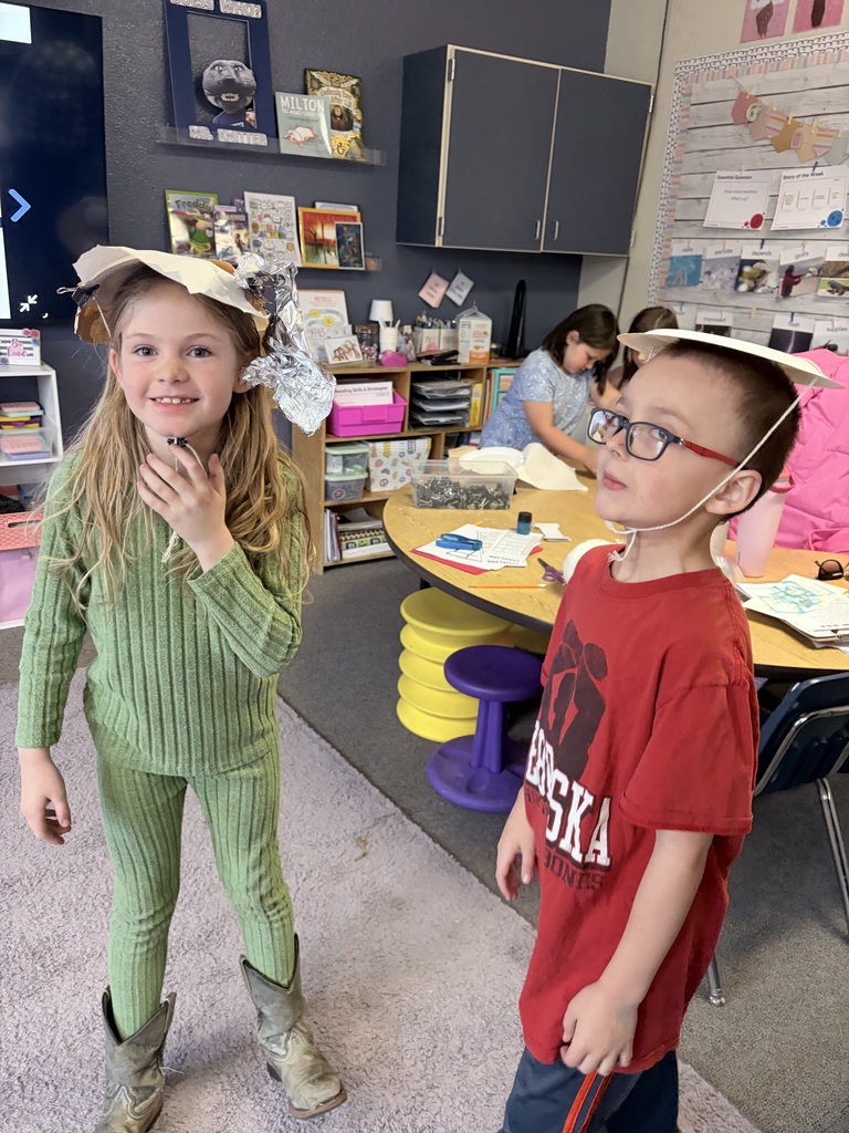 During Ms. Knitter's science class, her second graders explored the different properties of materials used for clothing, such as texture, absorbency, and flexibility. Students were tasked with the challenge to build a hat that best protected them from the sun. They were given aluminum foil, clips, paper bags, paper towels, and string. Creativity ensued! #celebrate379