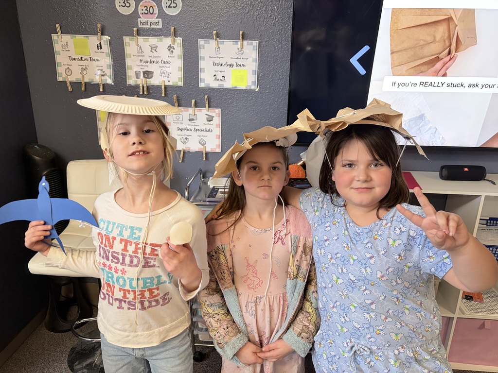 During Ms. Knitter's science class, her second graders explored the different properties of materials used for clothing, such as texture, absorbency, and flexibility. Students were tasked with the challenge to build a hat that best protected them from the sun. They were given aluminum foil, clips, paper bags, paper towels, and string. Creativity ensued! #celebrate379