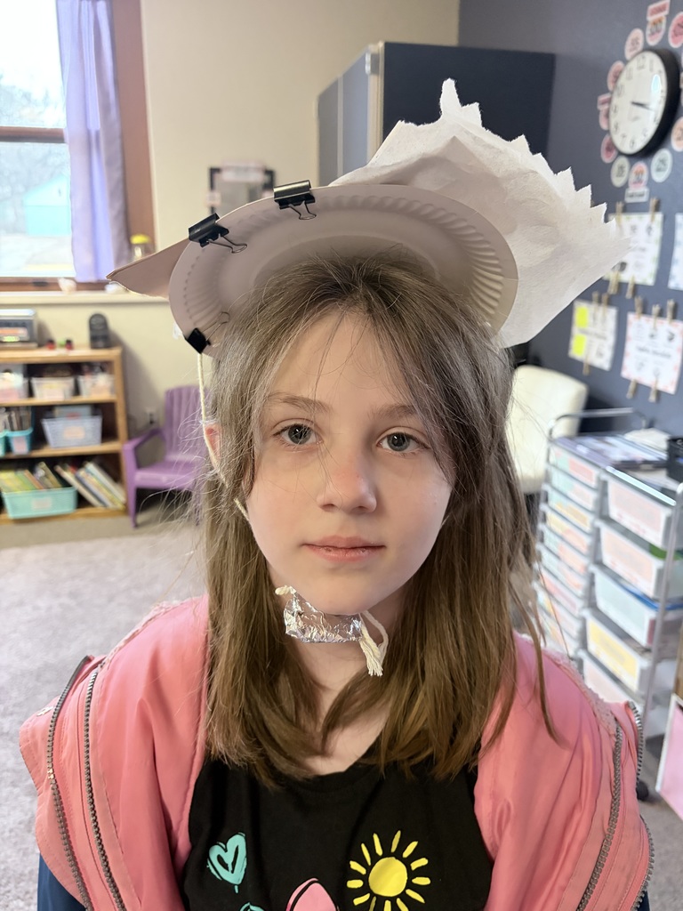 During Ms. Knitter's science class, her second graders explored the different properties of materials used for clothing, such as texture, absorbency, and flexibility. Students were tasked with the challenge to build a hat that best protected them from the sun. They were given aluminum foil, clips, paper bags, paper towels, and string. Creativity ensued! #celebrate379
