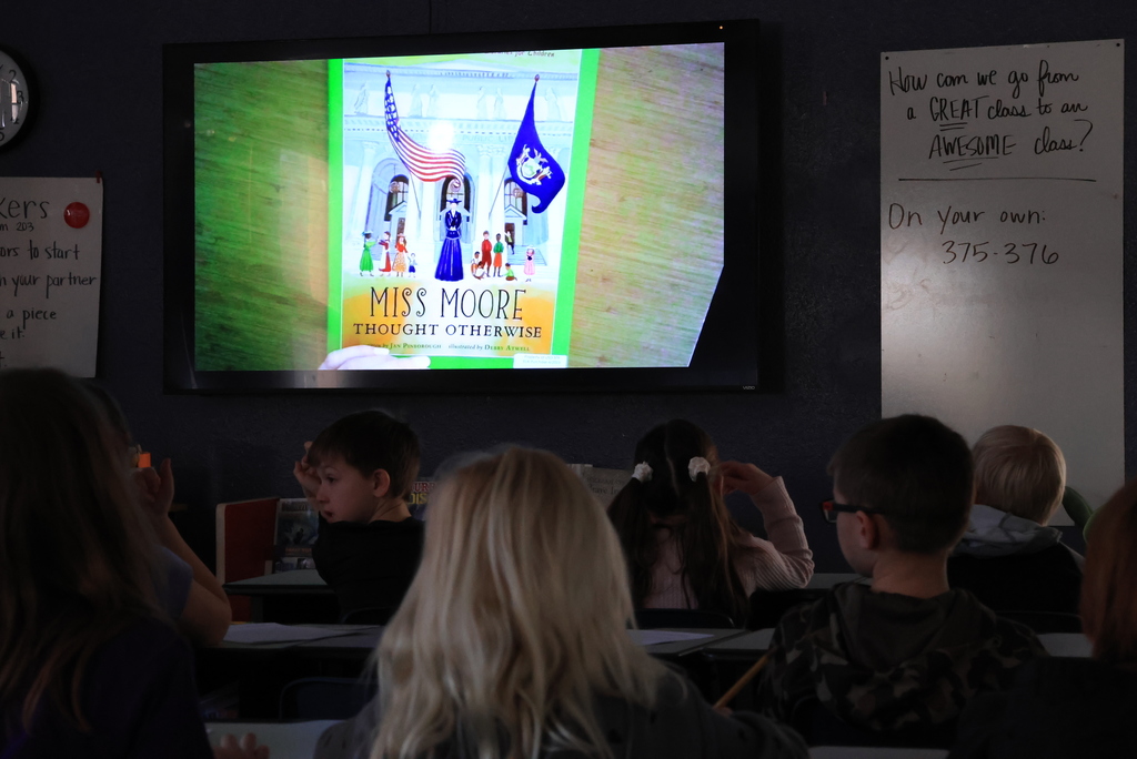 Second graders in Mrs. Weller's class started a new reading unit on biographies. They started with the Book, "Miss Moore Thought Otherwise", a picture book biography about Anne Carroll Moore, a librarian who revolutionized children's library services by establishing the first children's room at the New York Public Library. #celebrate379