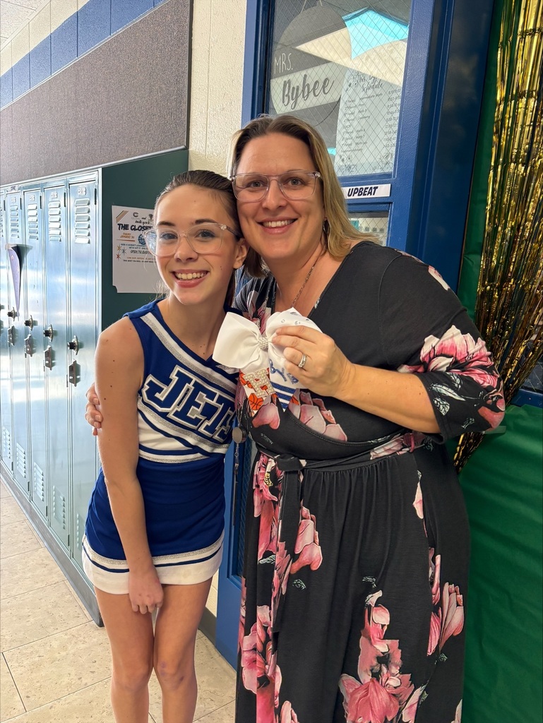 The junior high cheerleaders "threw it back" yesterday with previous uniforms worn by Jets alumni and a huge hair bump! The 8th graders also presented a teacher who had a positive impact on their education with a personalized cheer bow. #celebrate379