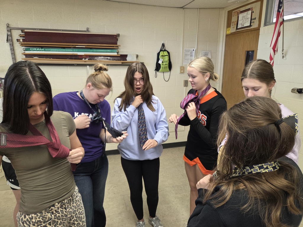 It's getting close to Mock Trial time in government classes! As part of the process, the seniors are teaching each other how to tie neckties! #celebrate379