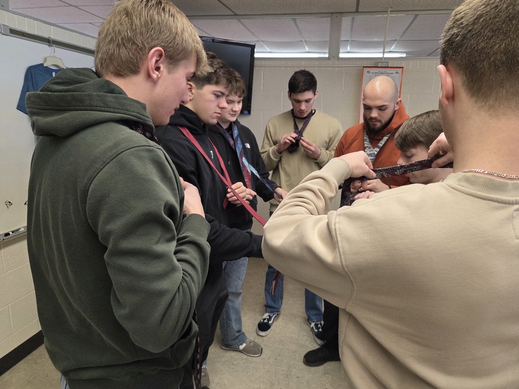 It's getting close to Mock Trial time in government classes! As part of the process, the seniors are teaching each other how to tie neckties! #celebrate379