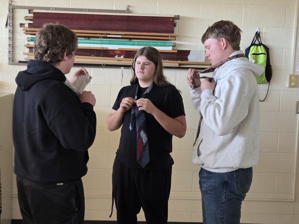 It's getting close to Mock Trial time in government classes! As part of the process, the seniors are teaching each other how to tie neckties! #celebrate379