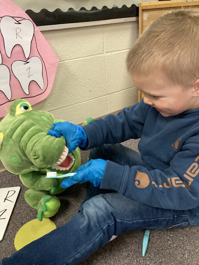 Thanks to the Clay County Health Department, every child in the full-day PreK room is going home with a bag of items to help keep their teeth healthy! The CCHD also loaned several learning tools to help students practice dental health care skills during the week. This dinosaur was a fan favorite! #celebrate379