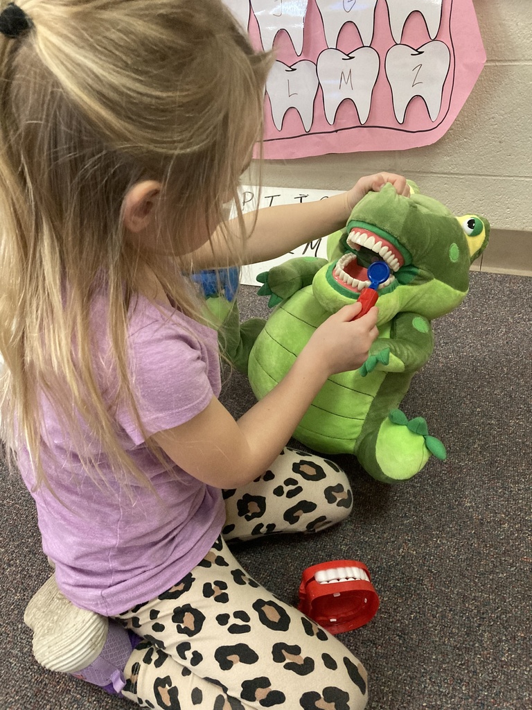 Thanks to the Clay County Health Department, every child in the full-day PreK room is going home with a bag of items to help keep their teeth healthy! The CCHD also loaned several learning tools to help students practice dental health care skills during the week. This dinosaur was a fan favorite! #celebrate379