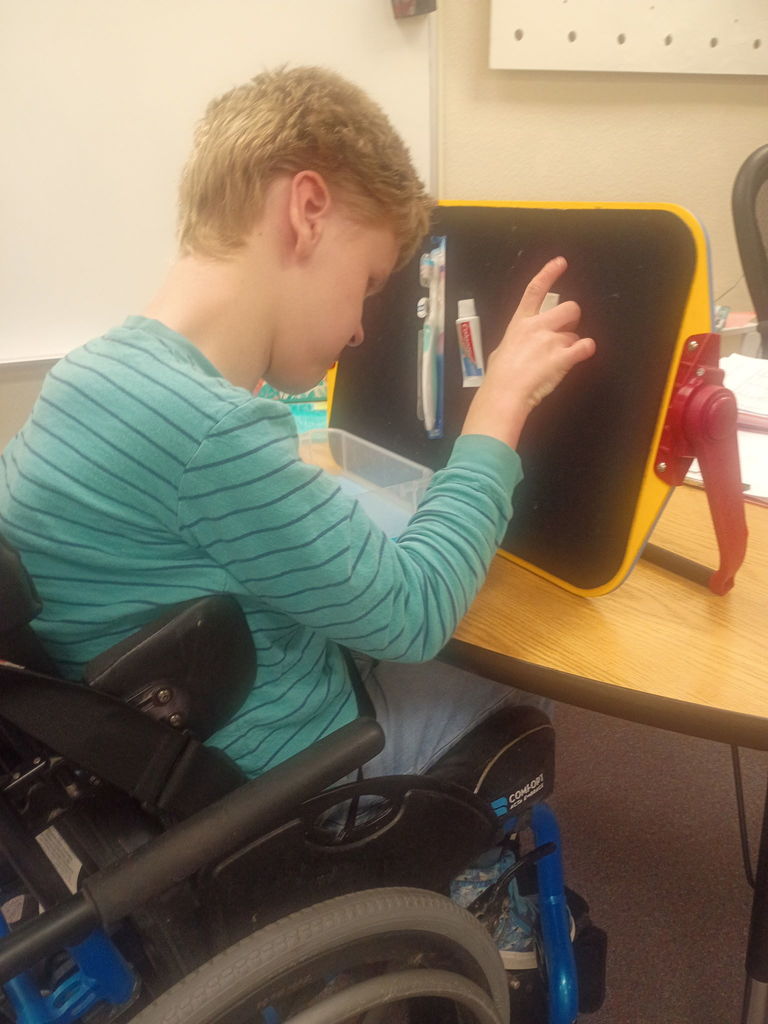 Two Garfield students have been working very hard on life and job skills this school year. They are currently working with a local dentist, Dr. Ferguson, to build the dental bags that are given out at appointments. Chase starts the process by identifying and sorting the items (toothbrush, floss, and toothpaste) and putting them in bins. Morrison then uses the bins, along with a template, to build the set of items needed for each bag. The finished bags will be taken to the dental office for their staff to give to patients. Thank you to Dr. Ferguson's office for supplying the materials for the students to use. It is teaching them important work and life skills! #celebrate379