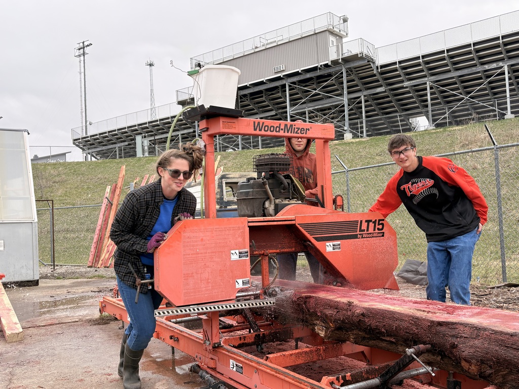 Mr. Pfizenmaier and Mrs. Schooley’s classes turned three logs into 28 boards yesterday! The boards, which are now drying in their kiln, will be used for future projects. #celebrate379