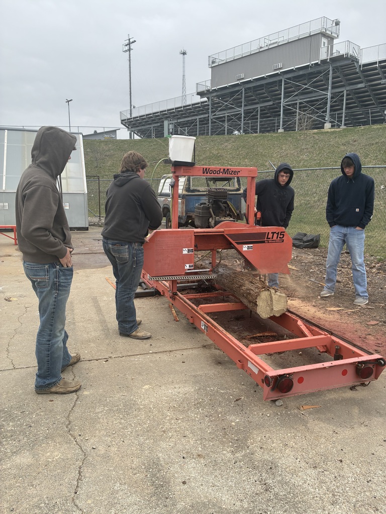 Mr. Pfizenmaier and Mrs. Schooley’s classes turned three logs into 28 boards yesterday! The boards, which are now drying in their kiln, will be used for future projects. #celebrate379