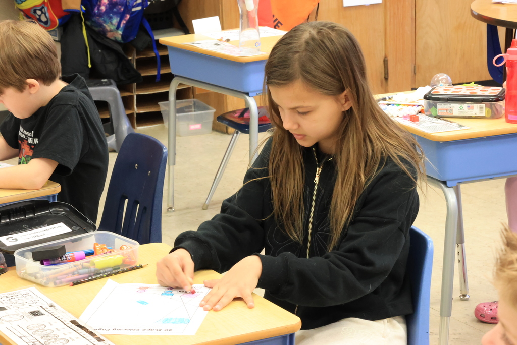 Mrs. Simon's second graders are already on their way to learning some geometry! Today, they drew lines to create different 2D shapes like triangles, squares, pentagons, and more. They then shared pages with each other to color in the shapes. #celebrate379