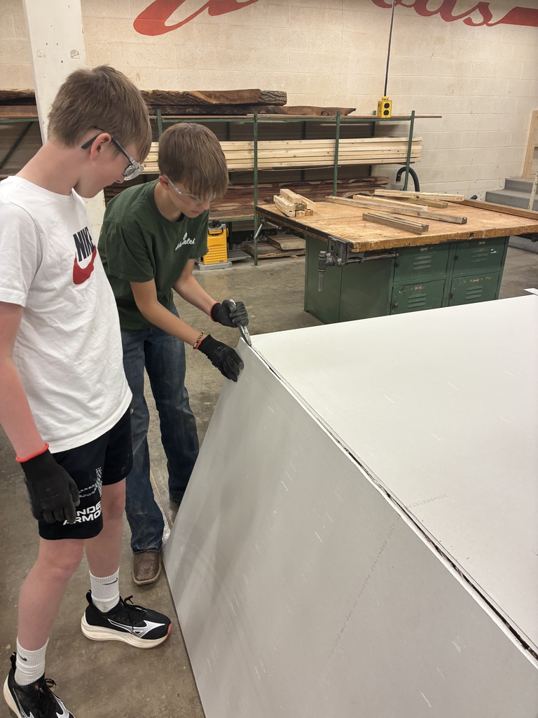 Mrs. Schooley's Industrial Arts students are installing drywall on their mini wall projects, so they took a trip up to the Tiger House to discuss the proper installation process. #celebrate379