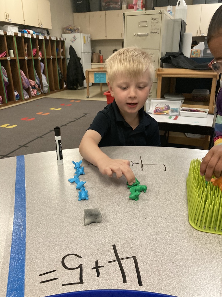 Mrs. Bruggeman's Pre-K students had a fun way to write and solve addition problems today! They did this by using their fine motor skills to pluck bugs from the garden and count them. Don’t tell Mrs. Lane, but they also wrote on the tables! #celebrate379