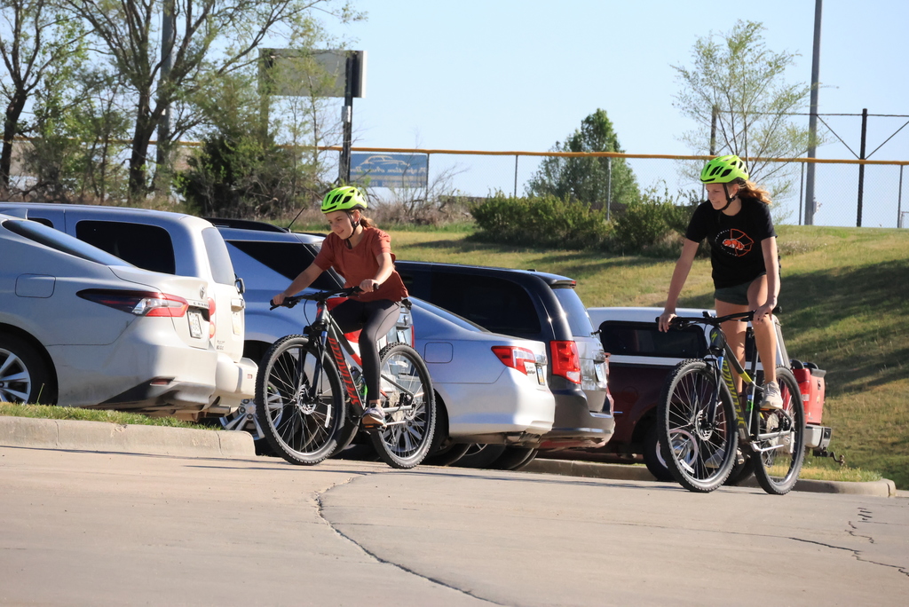 Mr. Smith's 7th grade P.E. students ride bikes in the CCCMS parking lot waiting to leave on their ride around town. #Celebrate379