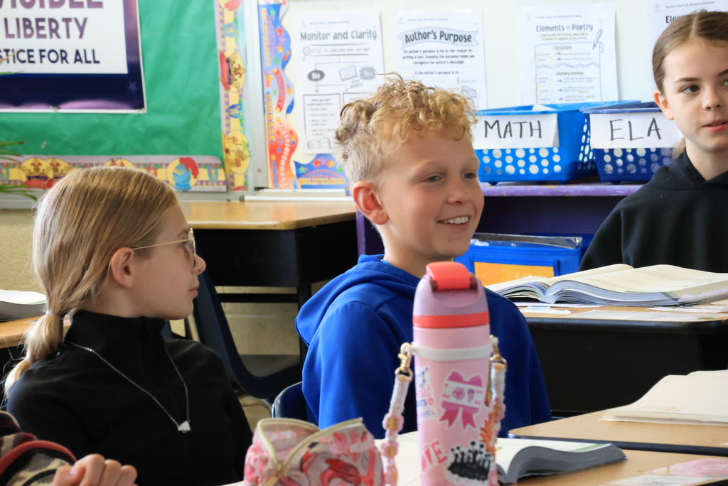 Students answer questions in math class.