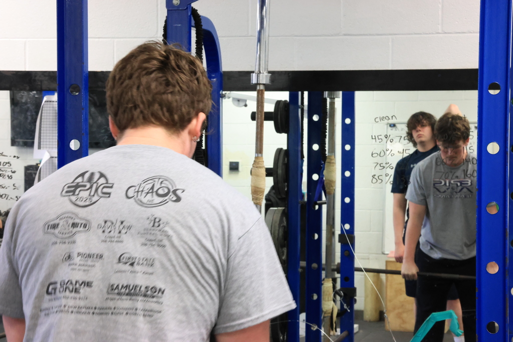 A student gets ready to complete a lift in Mr. Freeman's strength and conditioning class.