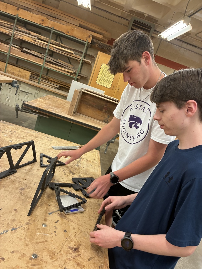 Seniors Caden Peterson and Brody Stenfors work on their bridge in Mrs. Schooley's class.