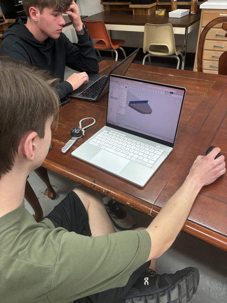 Senior Brody Stenfors works on CAD to create their bridge.