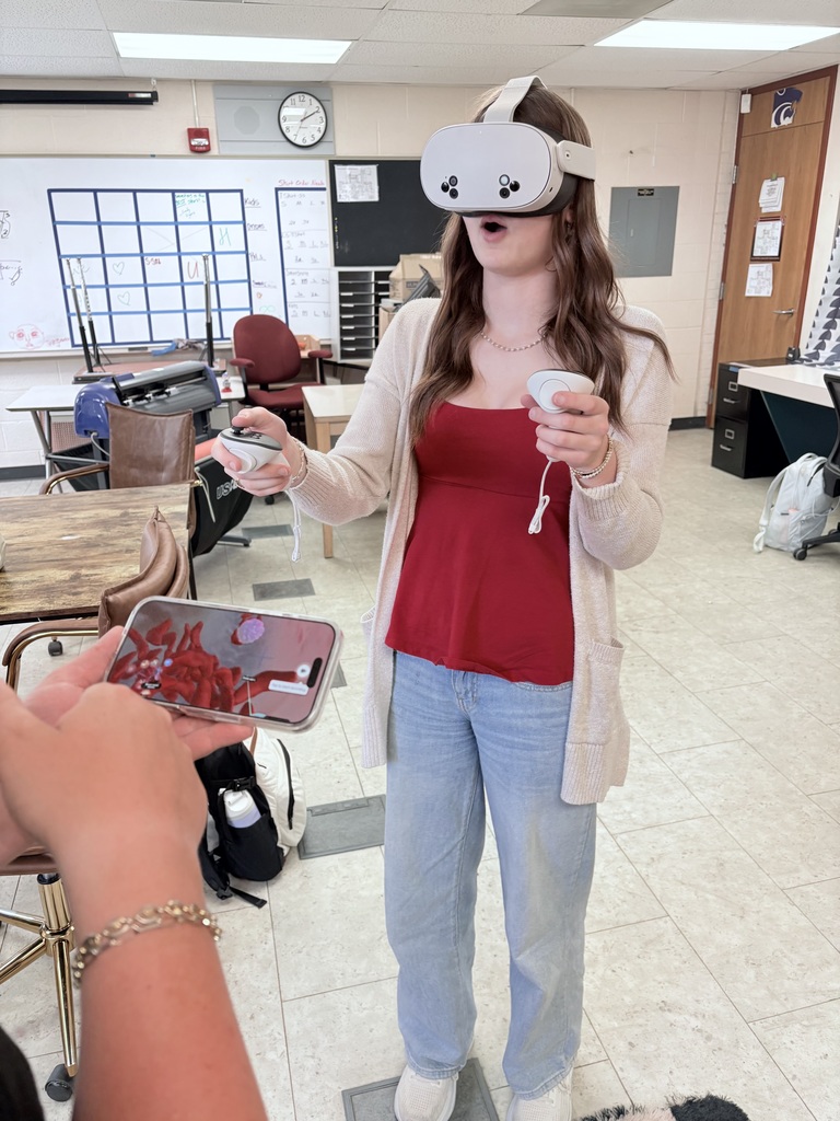 A student tries out the new Meta Quest 3 virtual reality glasses to view the CRISPR gene editing, which is used to eradicate diseases like Sickle Cell Anemia. 