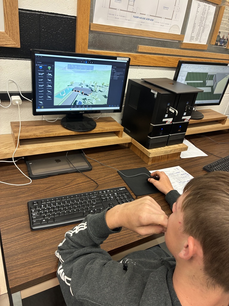 A student uses a new program called TwinMotion to help render their house designs. They can now create landscapes and select materials and colors to help personalize their designs..