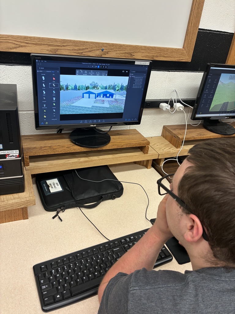 A student uses a new program called TwinMotion to help render their house designs. They can now create landscapes and select materials and colors to help personalize their designs..