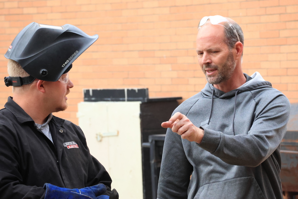 Mr. Craig and Mr. Mulligan talk about the process of creating the billboard.