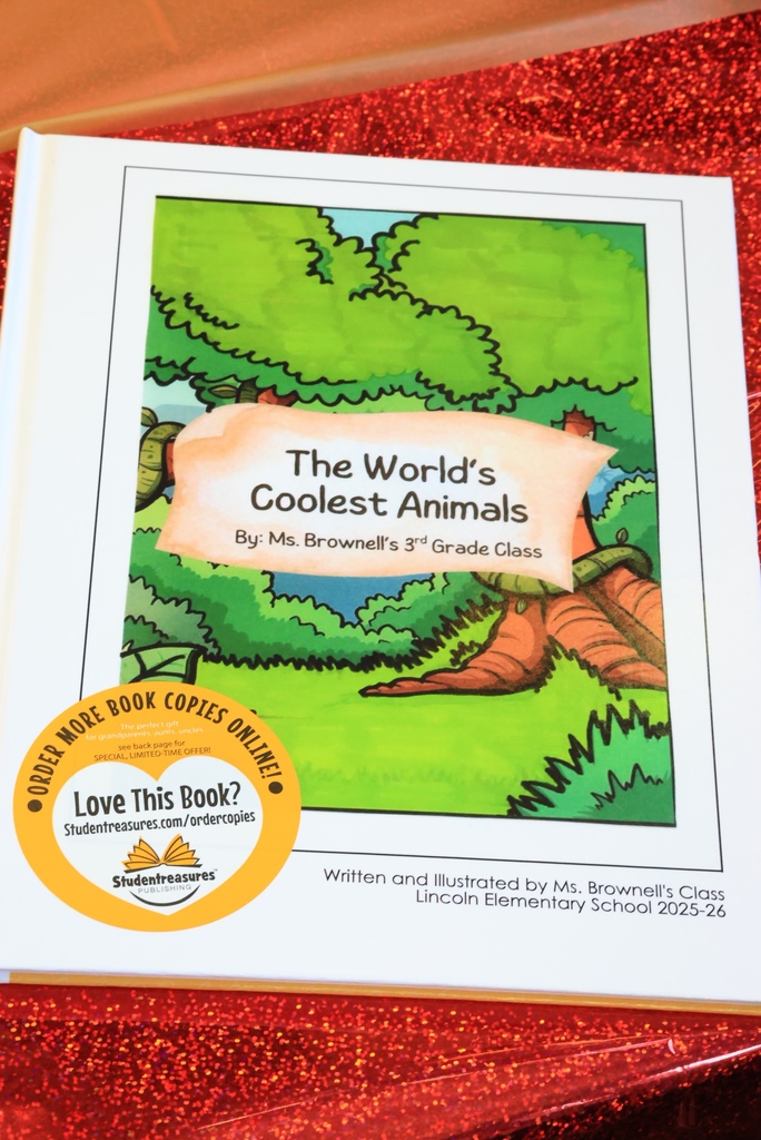 Ms. Brownell's class book, "The World's Coolest Animals", is presented to the class.