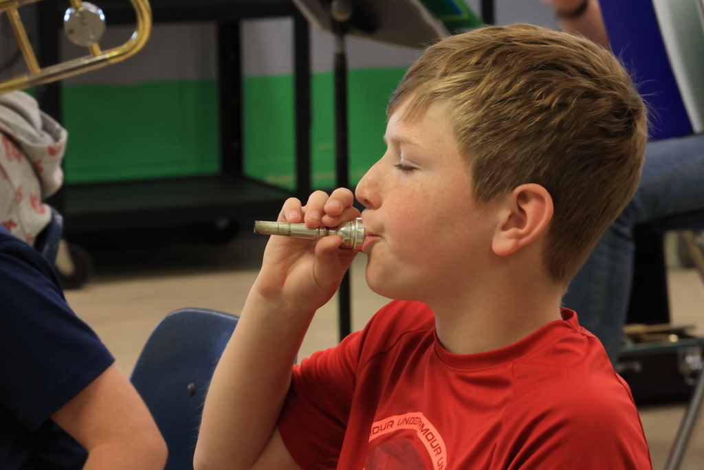 5th grade band students prepare for the upcoming  5-12 spring band concert.