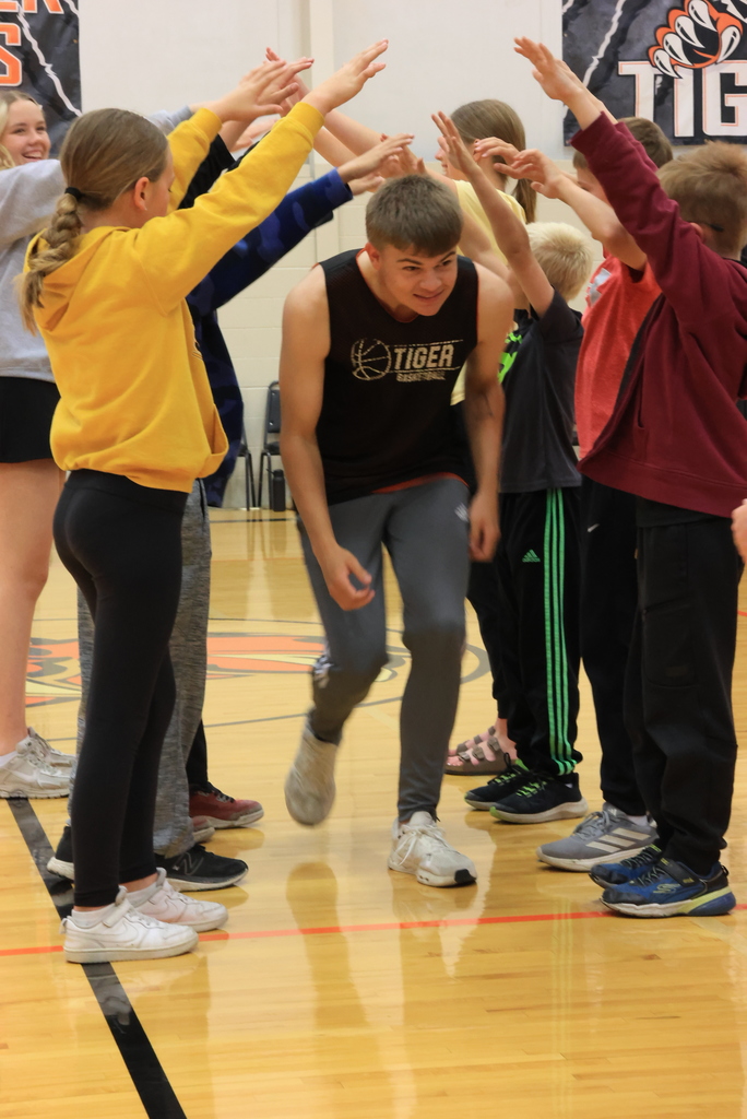 Students are introduced  and run through a human tunnel at the Garfield vs. CCCHS Student Council basketball game.
