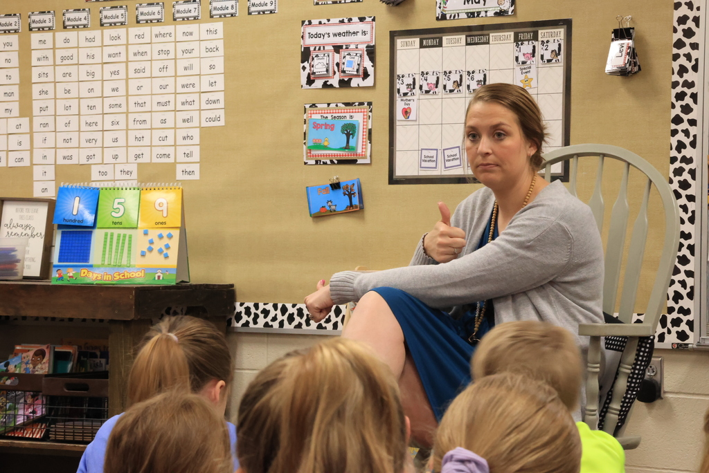 Mrs. Siebold gives a thumbs up after giving directions about an upcoming assignment.
