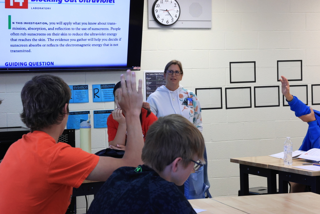 Mrs. Pfizenmaier talks to students about their upcoming lab dealing with ultraviolet rays.