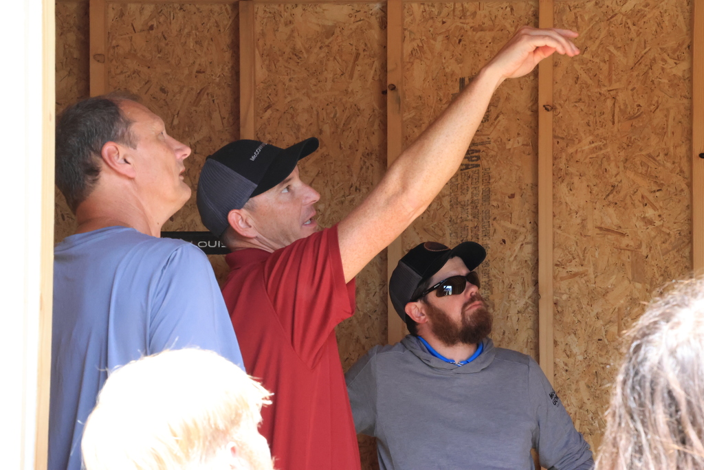 McCownGordon Regional Field Craft Manager Josh Ricketts reviews the nearly completed shed that Mr. Couch's students have been working on for the past couple of months.
