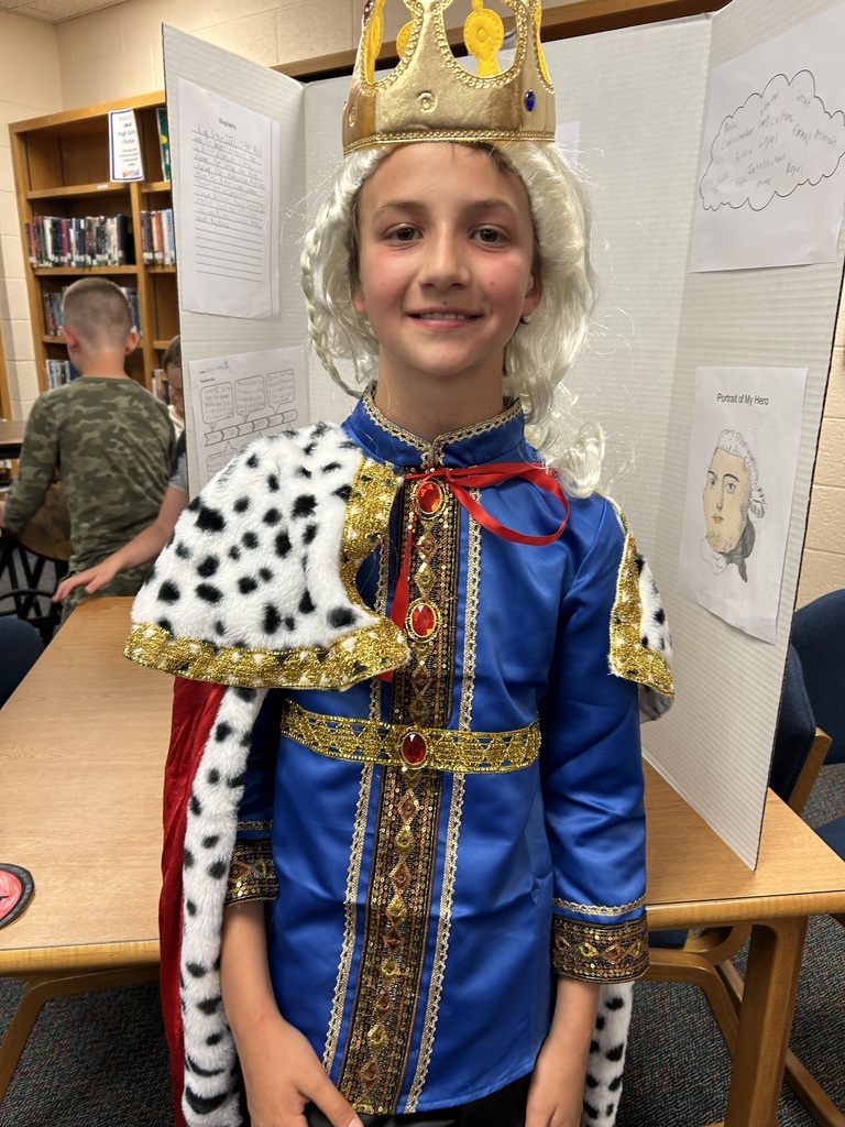 A student shows off his American Revolutionary War Hero Wax Museum character, where they dressed as American colonists and presented how their character contributed to the American Revolution.