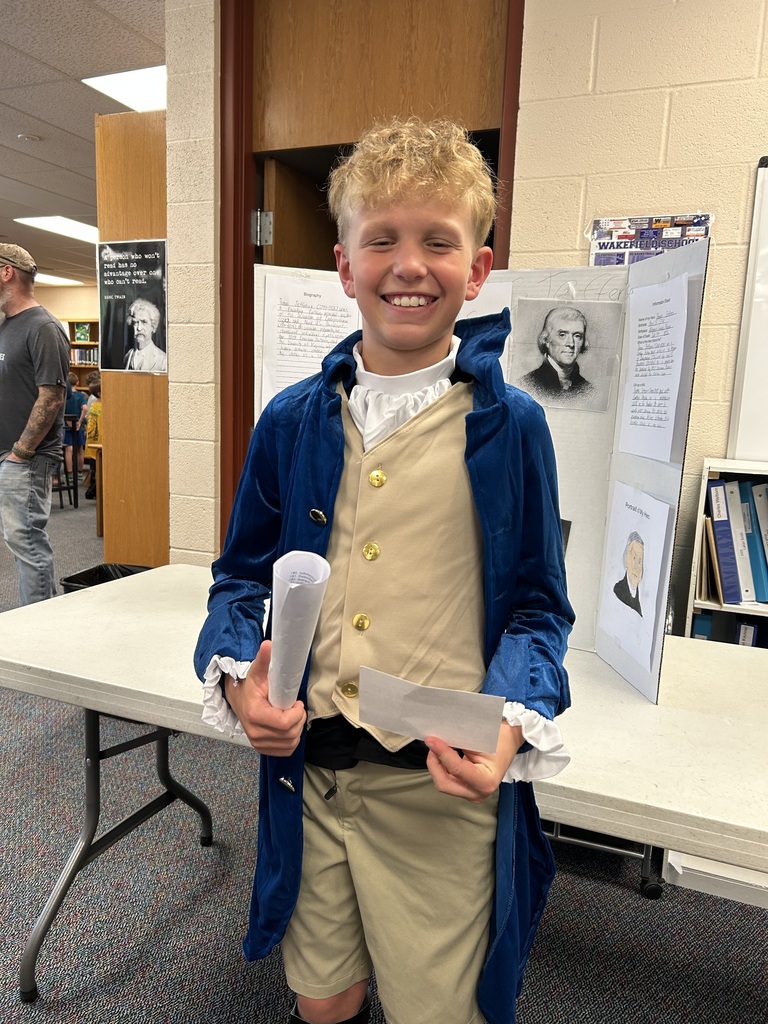 A student shows off his American Revolutionary War Hero Wax Museum character, where they dressed as American colonists and presented how their character contributed to the American Revolution.