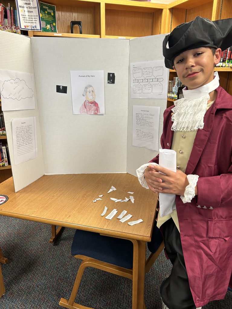 A student shows off his American Revolutionary War Hero Wax Museum character, where they dressed as American colonists and presented how their character contributed to the American Revolution.