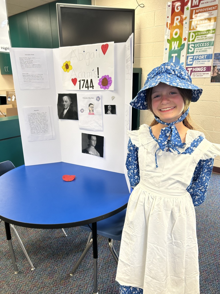 A student shows off her American Revolutionary War Hero Wax Museum character, where they dressed as American colonists and presented how their character contributed to the American Revolution.