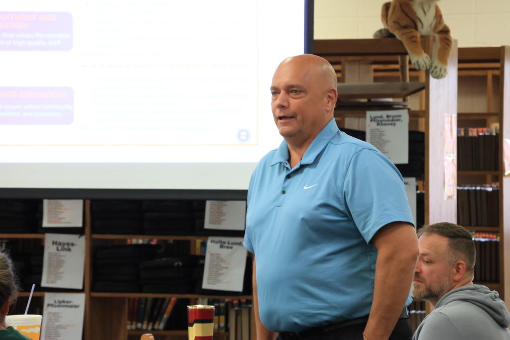 New teachers, principals, and counselors were welcomed at the New Teacher Academy on August 7th. They were asked to stand up and introduce themselves.