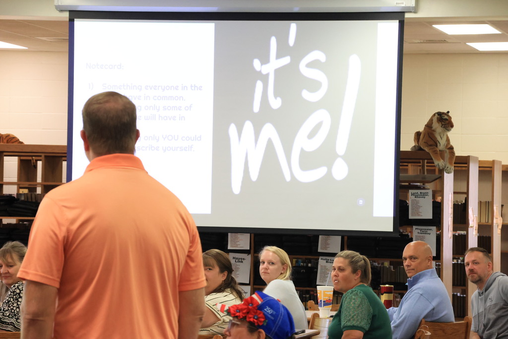 New teachers, principals, and counselors were welcomed at the New Teacher Academy on August 7th. They were asked to stand up and introduce themselves.