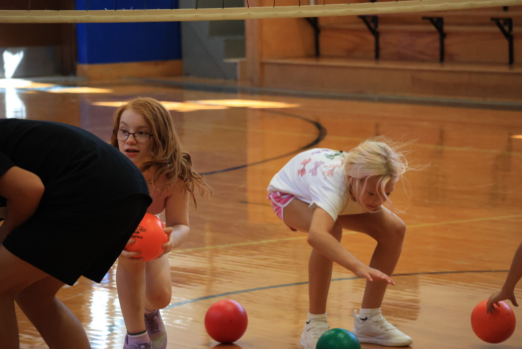6th graders play dodgeball during Mr. McDonald's P.E. class.