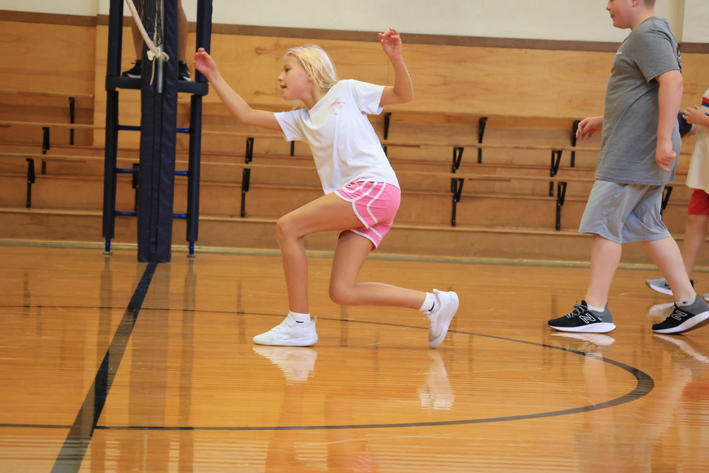 6th graders play dodgeball during Mr. McDonald's P.E. class.