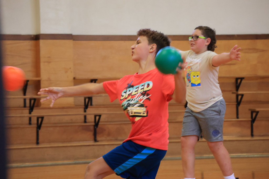 6th graders play dodgeball during Mr. McDonald's P.E. class.