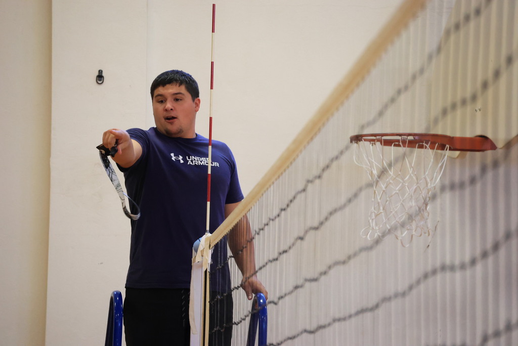 P.E. teacher Mr. McDonald instructs his class during class.