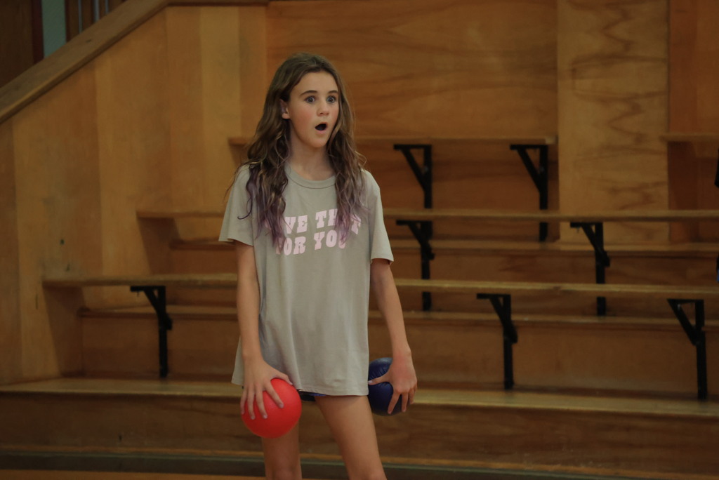 6th graders play dodgeball during Mr. McDonald's P.E. class.