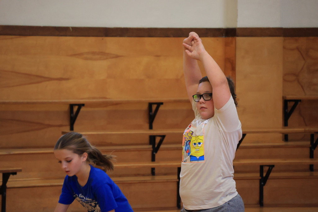 6th graders play dodgeball during Mr. McDonald's P.E. class.
